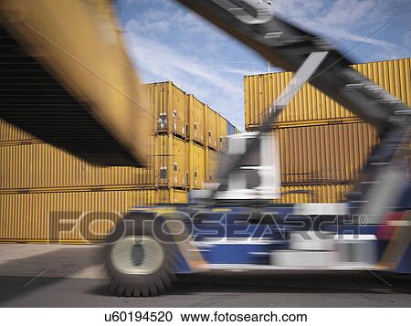 Shipping container stacker in port View Large Photo Image Stock Image - Shipping container stacker in port. Fotosearch
