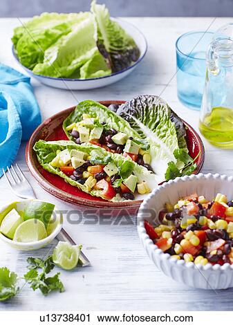 Spicy bean and corn, lettuce cups View Large Photo Image Stock Image - Spicy bean and corn, lettuce cups. Fotosearch