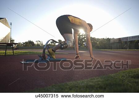 Sprinter in start position View Large Photo Image Stock Photography - Sprinter in start position. Fotosearch