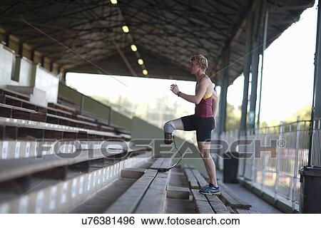 Stock Photograph - Sprinter walking with prosthetic leg on. Fotosearch