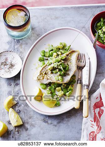 Steamed snapper fish with beans View Large Photo Image Stock Photo - Steamed snapper fish with beans. Fotosearch