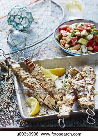 Stock Photograph - Swordfish souvlaki. Fotosearch