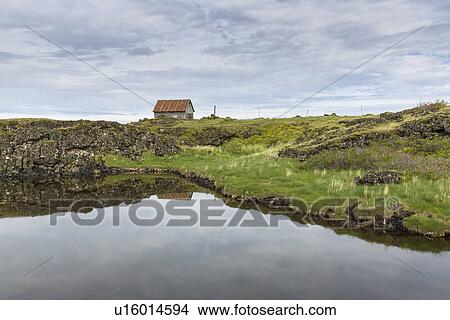 View of hut and fjord, Hvalfjordur, Iceland View Large Photo Image Picture - View of hut and fjord, Hvalfjordur, Iceland. Fotosearch