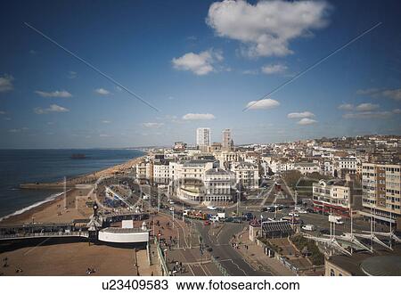 Stock Image - View of sea, beach and coastline, Brighton, East Sussex, UK. Fotosearch