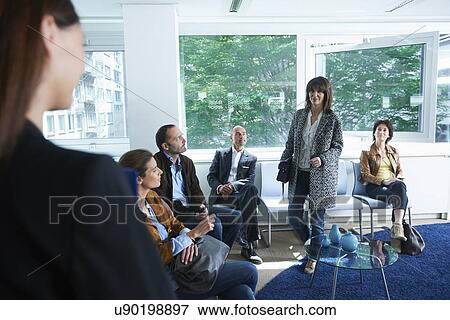 Woman being called for interview View Large Photo Image Stock Photo - Woman being called for interview. Fotosearch
