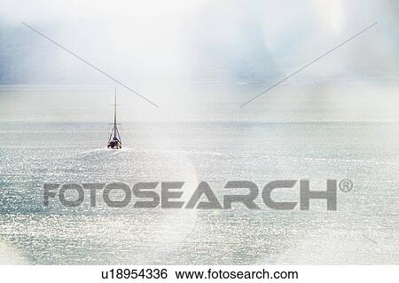 Yacht sailing off the coast of Scottish Highlands, Scotland View Large Photo Image Stock Photograph - Yacht sailing off the coast of Scottish Highlands, Scotland. Fotosearch