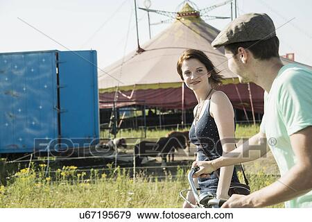Young couple at funfair View Large Photo Image Stock Photo - Young couple at funfair. Fotosearch
