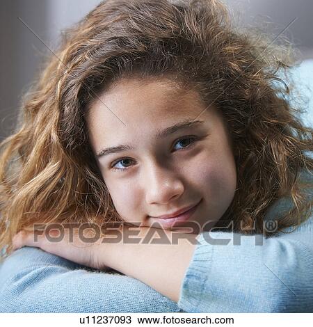Young girl with brown hair, smiling, portrait View Large Photo Image Stock Image - Young girl with brown hair, smiling, portrait. Fotosearch