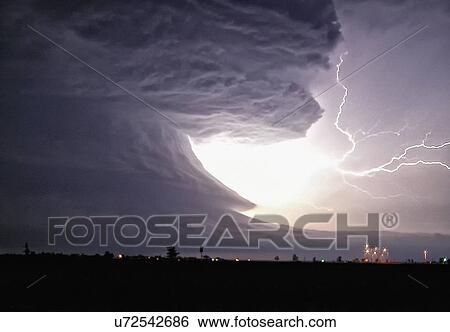 An explosive cloud-to-cloud bolt shoots from this tornadic supercell with highly structured rotation, Pampa, Texas, USA View Large Photo Image Stock Photograph - An explosive cloud-to-cloud bolt shoots from this tornadic supercell with highly structured rotation, Pampa, Texas, USA. Fotosearch