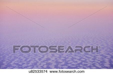 Atmospheric elevated view above the clouds View Large Photo Image Picture - Atmospheric elevated view above the clouds. Fotosearch