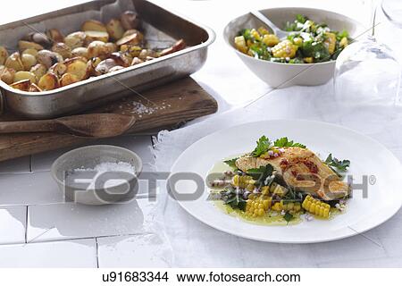 Picture - Blue-eye trevalla with corn and parsley. Fotosearch