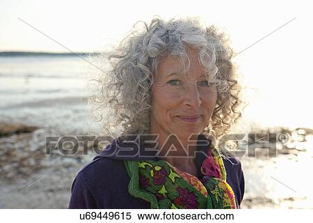 Close up of mature woman by beach View Large Photo Image Stock Photography - Close up of mature woman by beach. Fotosearch