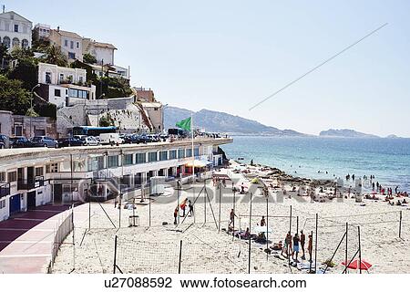 Crowds of holiday makers on beach, Marseille, France View Large Photo Image Stock Image - Crowds of holiday makers on beach, Marseille, France. Fotosearch