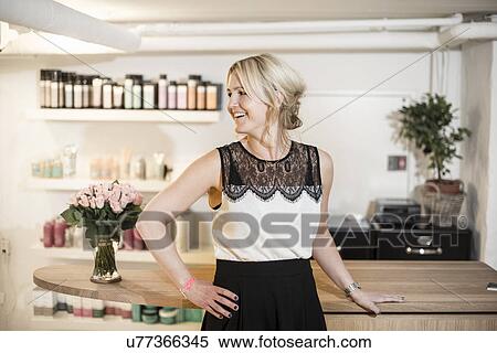 Female business owner in hair salon, portrait View Large Photo Image Stock Photography - Female business owner in hair salon, portrait. Fotosearch