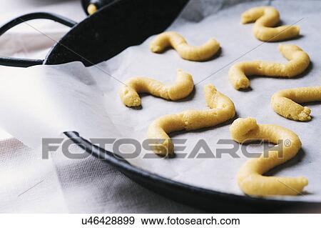 Stock Photo - Finger food on baking paper. Fotosearch