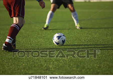 Football players during game View Large Photo Image Stock Image - Football players during game. Fotosearch