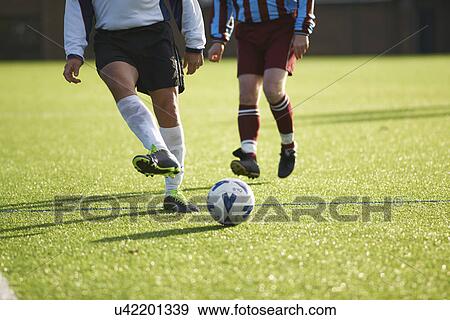 Football players during game View Large Photo Image Stock Photo - Football players during game. Fotosearch