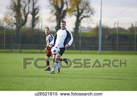 Football players during game View Large Photo Image Stock Photography - Football players during game. Fotosearch