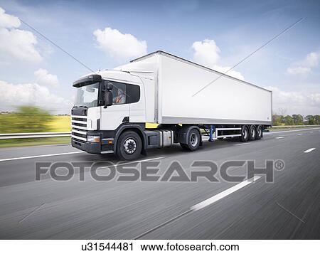 Freight truck on the move on motorway View Large Photo Image Stock Image - Freight truck on the move on motorway. Fotosearch
