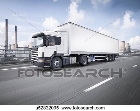Stock Photography - Freight truck on the move on motorway. Fotosearch