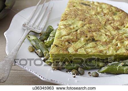Frittata on white plate View Large Photo Image Stock Image - Frittata on white plate. Fotosearch