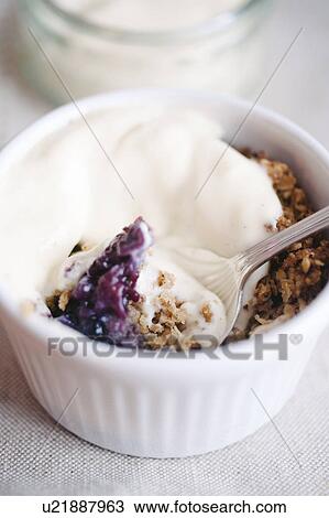 Fruit crumble in ramekin View Large Photo Image Stock Image - Fruit crumble in ramekin. Fotosearch