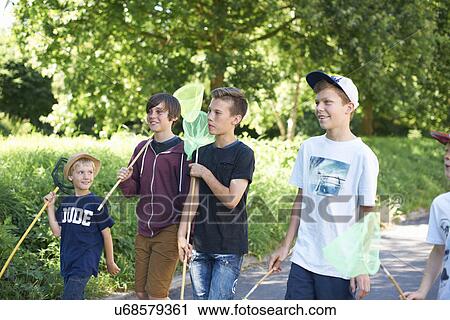 Group of boys with fishing nets View Large Photo Image Stock Image - Group of boys with fishing nets. Fotosearch