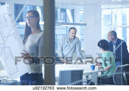 Group of business people having discussion View Large Photo Image Stock Image - Group of business people having discussion. Fotosearch