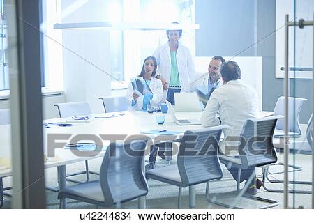 Group of researchers having meeting View Large Photo Image Picture - Group of researchers having meeting. Fotosearch