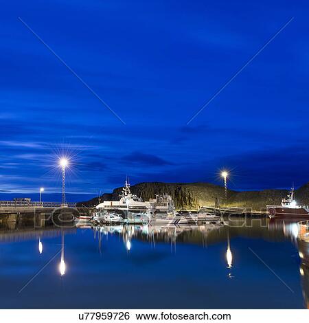 Stock Photograph - Harbour at dusk, Stykkisholmur, Snaefellsnes, Iceland. Fotosearch
