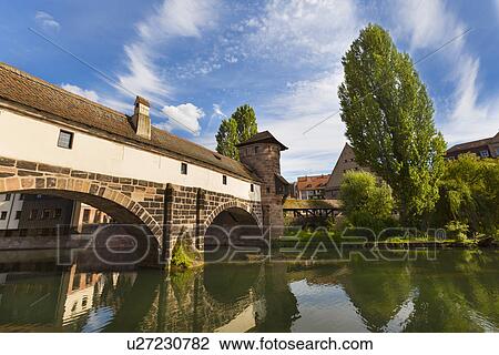 Henkersteg bridge and Pegnitz river, Nuremberg, Bavaria, Germany View Large Photo Image Stock Image - Henkersteg bridge and Pegnitz river, Nuremberg, Bavaria, Germany. Fotosearch