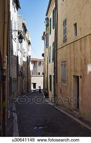 House exteriors along alleyway, Marseille, France View Large Photo Image Stock Photo - House exteriors along alleyway, Marseille, France. Fotosearch