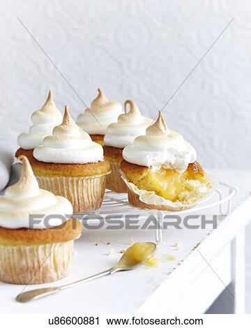 Stock Image - Lemon cupcake meringues. Fotosearch