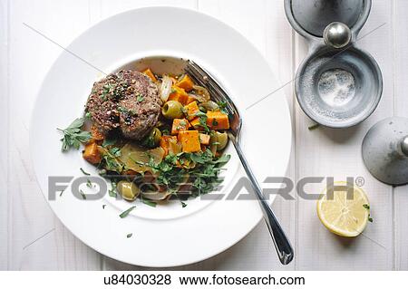Meat and vegetable dish View Large Photo Image Stock Photo - Meat and vegetable dish. Fotosearch