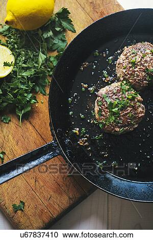 Meat frying in pan View Large Photo Image Stock Image - Meat frying in pan. Fotosearch