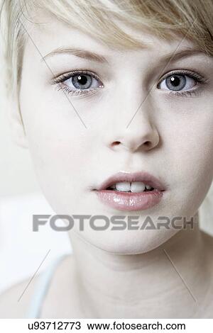 Stock Image - Pensive teenage girl, close up. Fotosearch