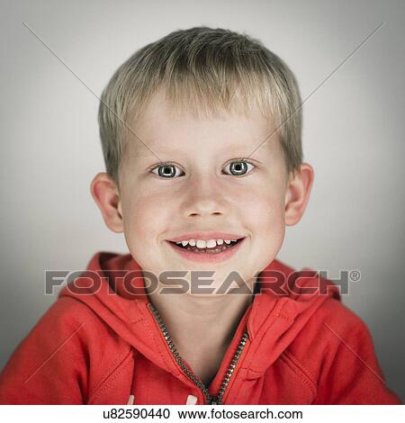 Portrait of a playful boy View Large Photo Image Stock Image - Portrait of a playful boy. Fotosearch