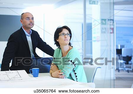 Portrait of two business people View Large Photo Image Picture - Portrait of two business people. Fotosearch