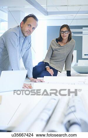 Picture - Portrait of two business people. Fotosearch