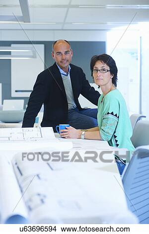 Portrait of two business people View Large Photo Image Picture - Portrait of two business people. Fotosearch