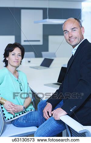 Portrait of two business people View Large Photo Image Stock Image - Portrait of two business people. Fotosearch