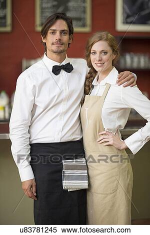 Portrait of waitress and waiter in restaurant View Large Photo Image Stock Photography - Portrait of waitress and waiter in restaurant. Fotosearch
