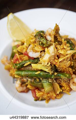 Prawn and asparagus dish, close up View Large Photo Image Stock Photo - Prawn and asparagus dish, close up. Fotosearch
