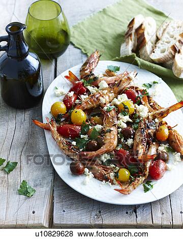 Stock Photo - Prawn saganaki. Fotosearch