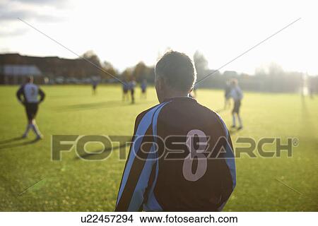 Rearview of football player number 8 View Large Photo Image Picture - Rearview of football player number 8. Fotosearch