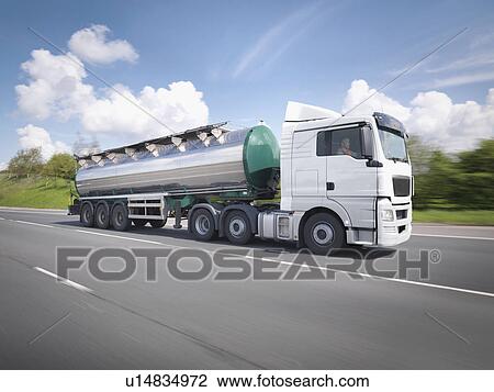 Stock Image - Tanker truck on the move on motorway. Fotosearch
