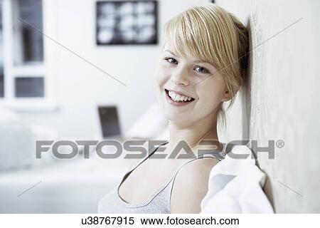 Stock Photography - Teenage girl smiling, portrait. Fotosearch
