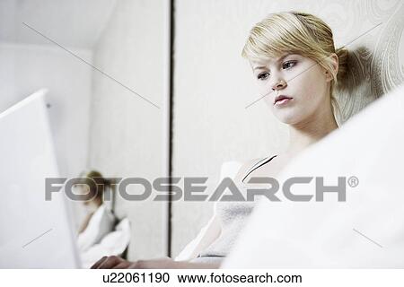 Teenage girl studying on a computer View Large Photo Image Stock Image - Teenage girl studying on a computer. Fotosearch