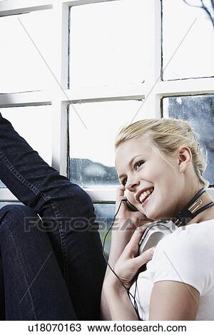 Teenage girl with headphones View Large Photo Image Stock Image - Teenage girl with headphones. Fotosearch