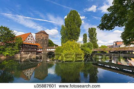 View of Henkersteg bridge and Pegnitz river, Nuremberg, Bavaria, Germany View Large Photo Image Stock Image - View of Henkersteg bridge and Pegnitz river, Nuremberg, Bavaria, Germany. Fotosearch